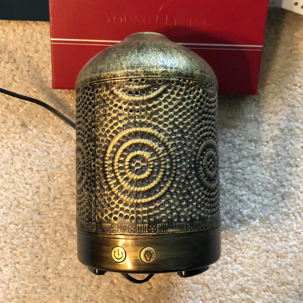 Young Living essential oil bronze diffuser lights